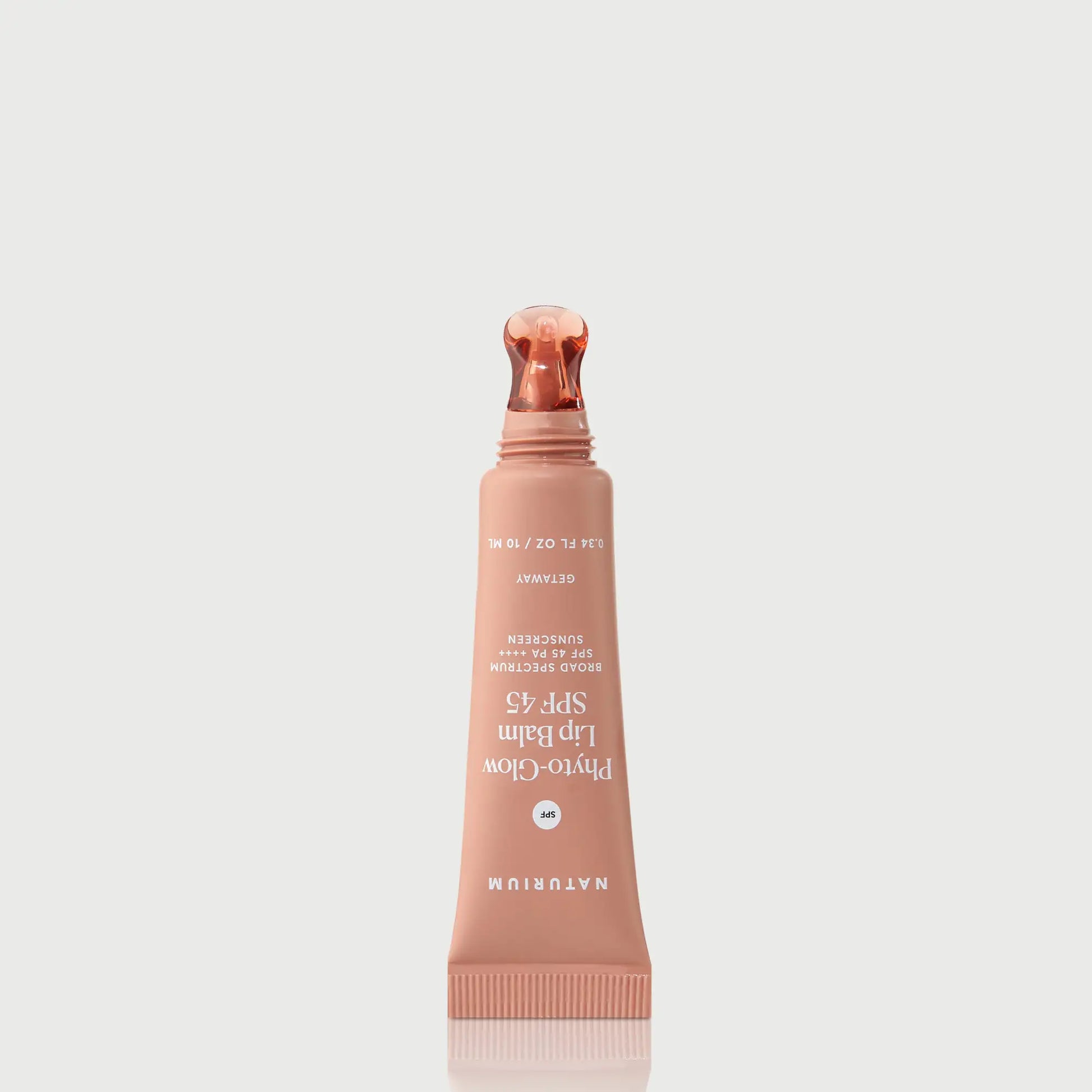 phyto-glow-lip-balm-spf-45-getaway-b6 NATR-10126_PhytoGlow_SPF_Getaway_primary_nocap_bonebkgd_1.webp
